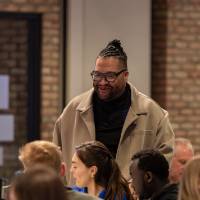 Dr. Shorty talking with luncheon attendees